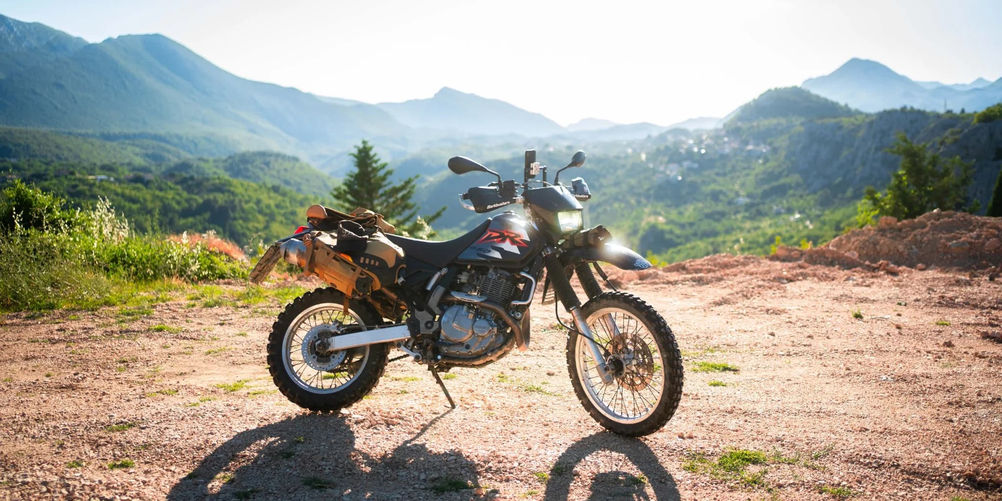 Loaded DR650 on a mountain road stop