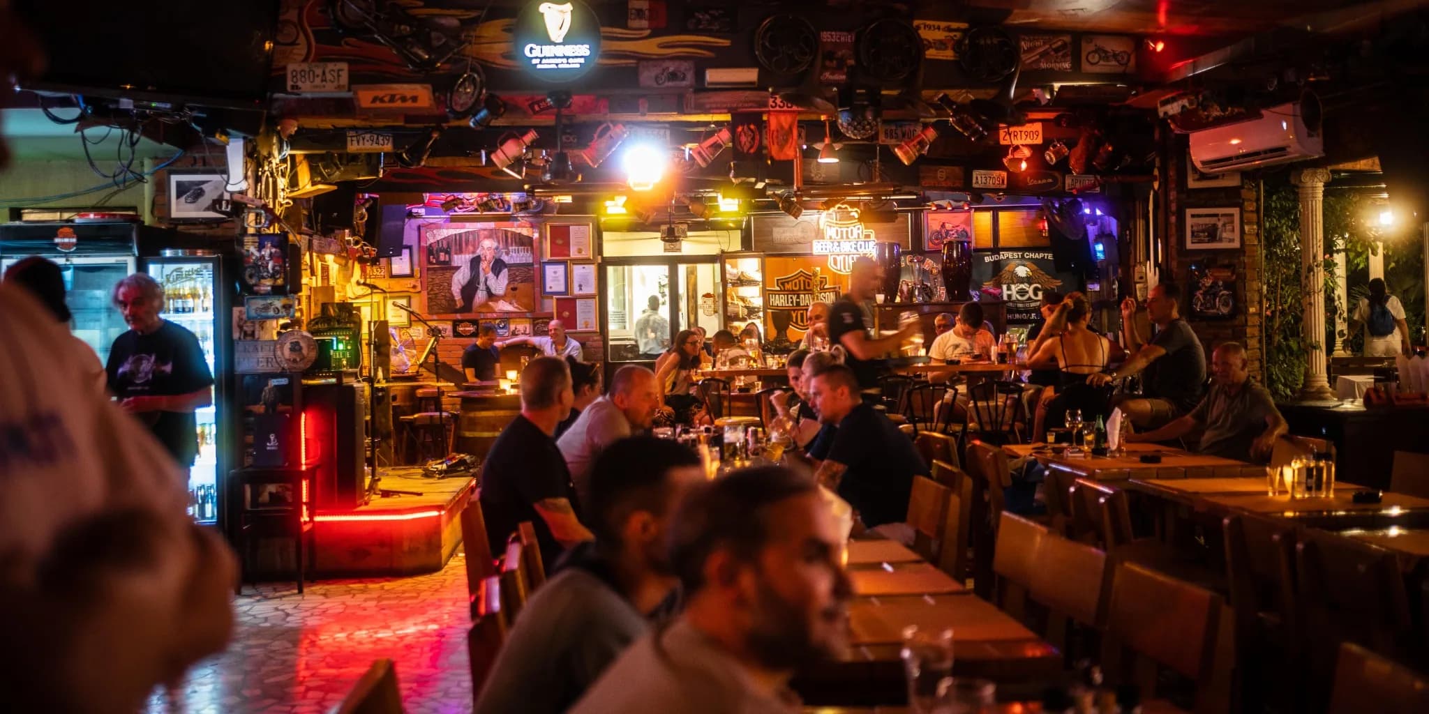 Motorcycle at a coastal overlook at sunset