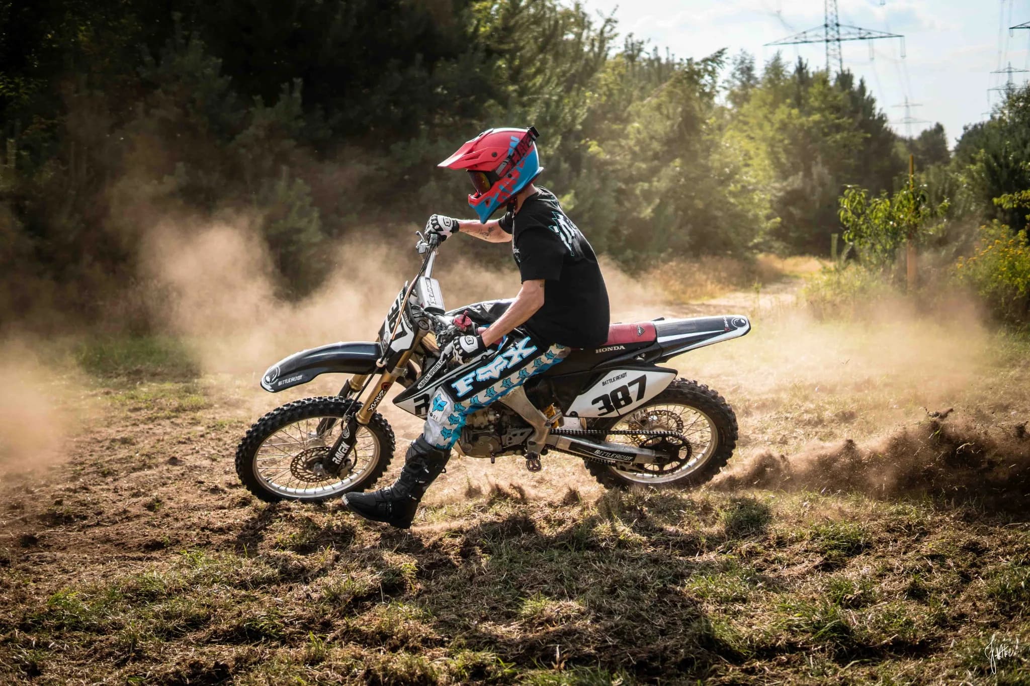 Sport bikes parked by a rail yard