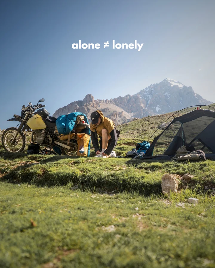 Alone is not lonely: camp set up below a mountain
